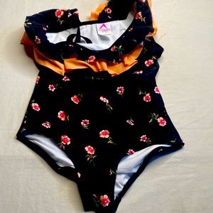 KAMI size 12 Swim suit black with flowers and orange trim, off the shoulder